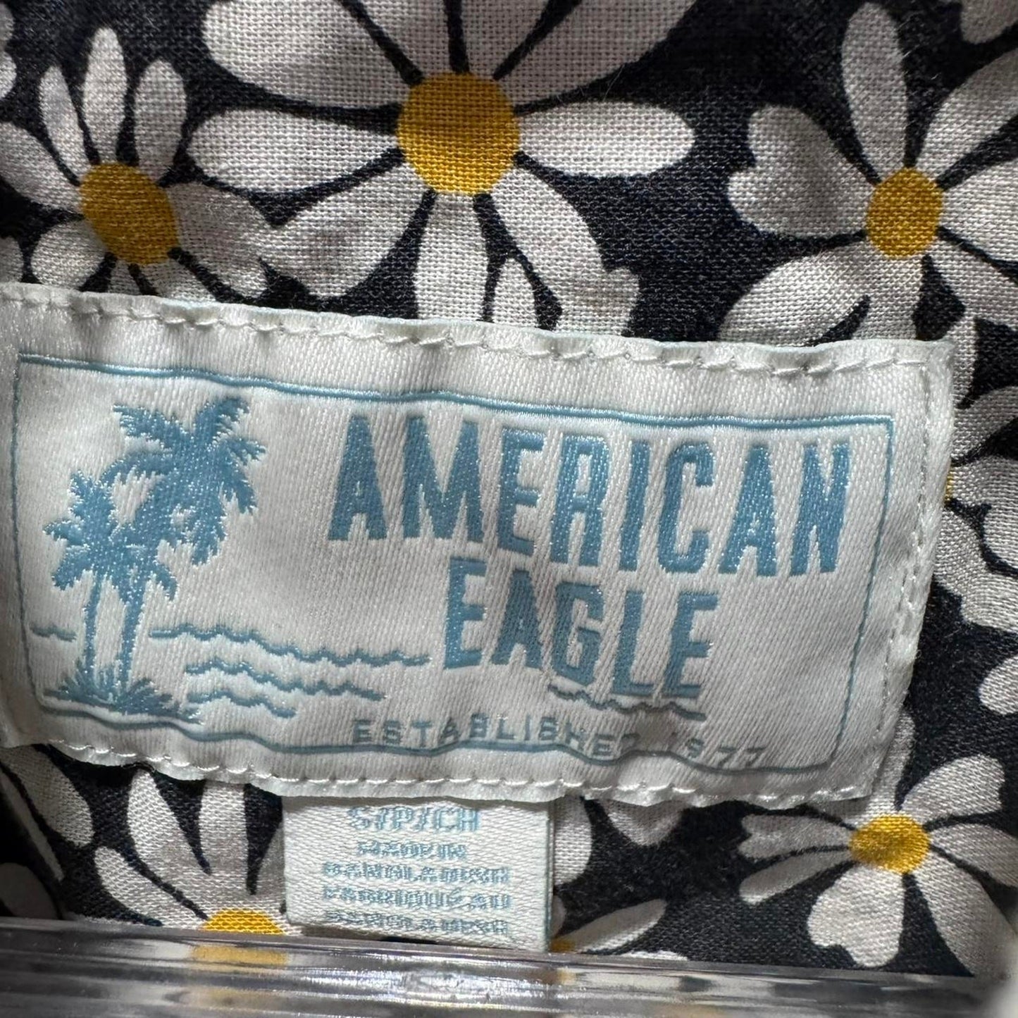 American Eagle size SMALL black and yellow daisy button up shirt