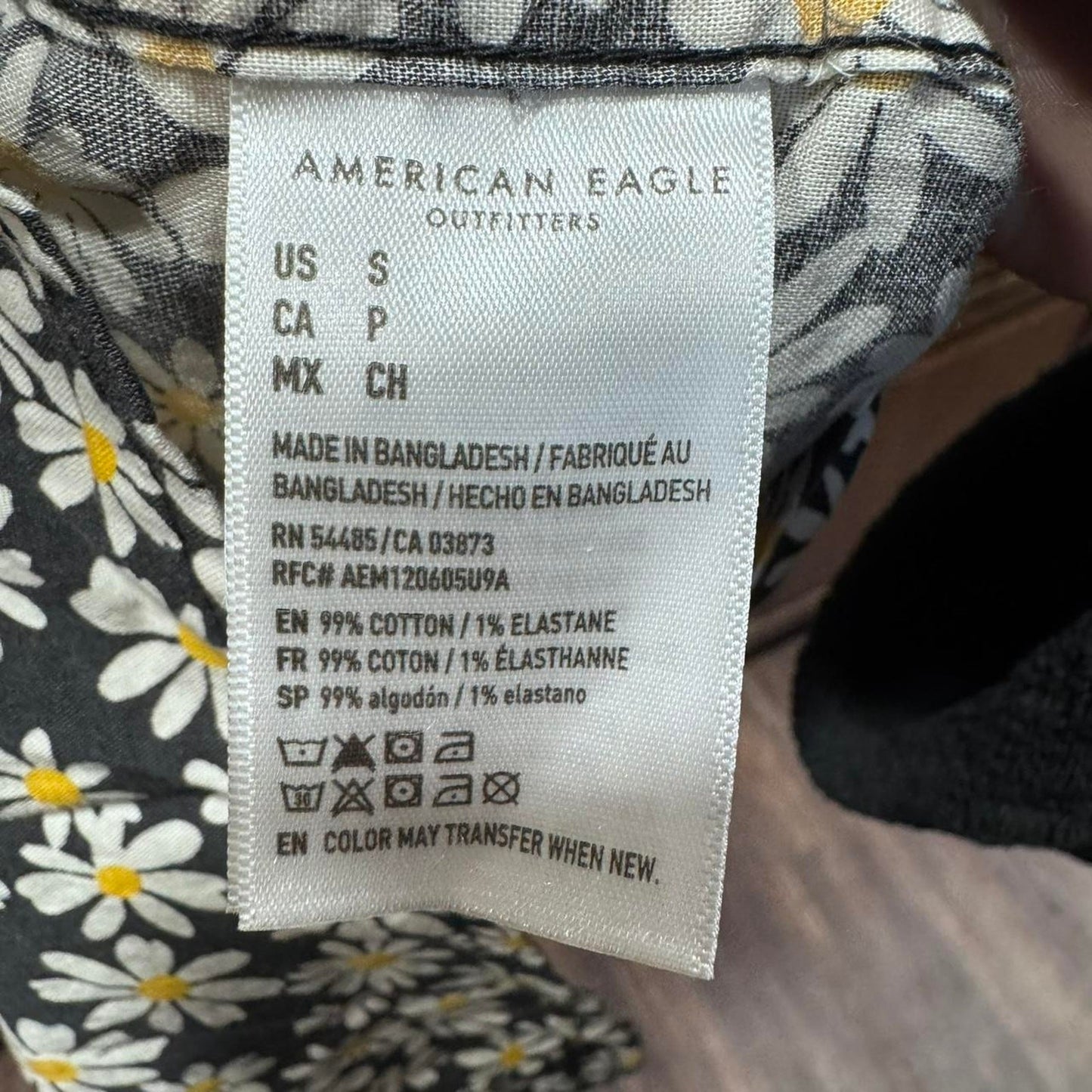 American Eagle size SMALL black and yellow daisy button up shirt